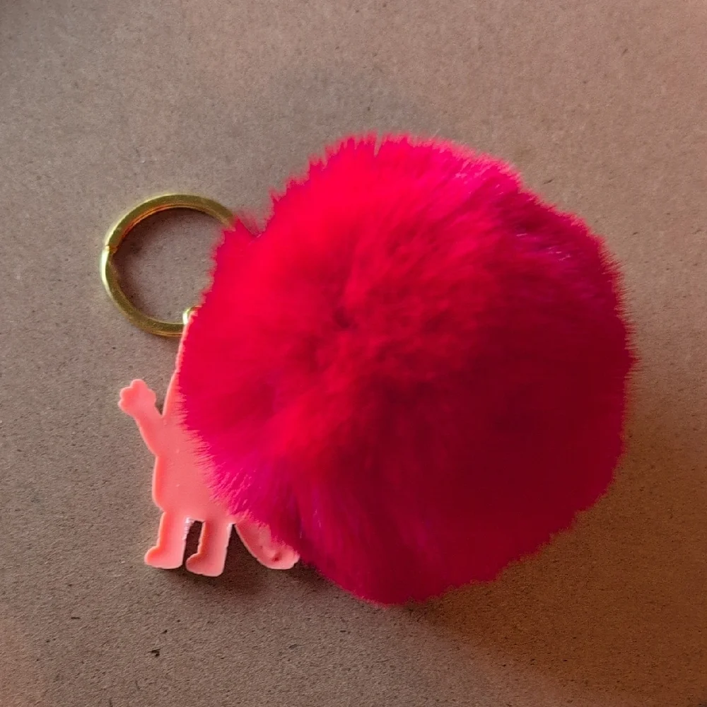 Vibrant Red Fluffy Keychain with Cartoon Charm